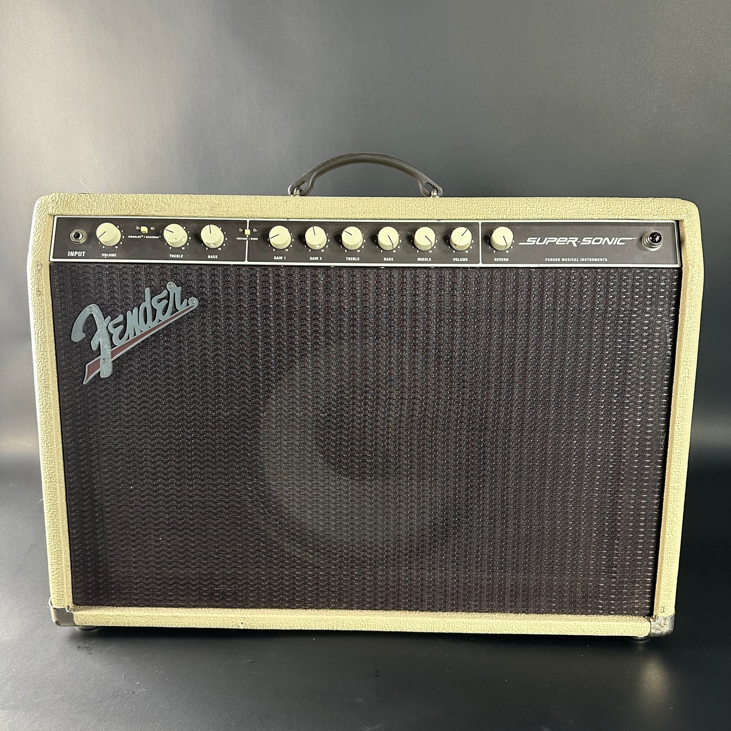 Fender Super Sonic guitar amplifier on a gray background