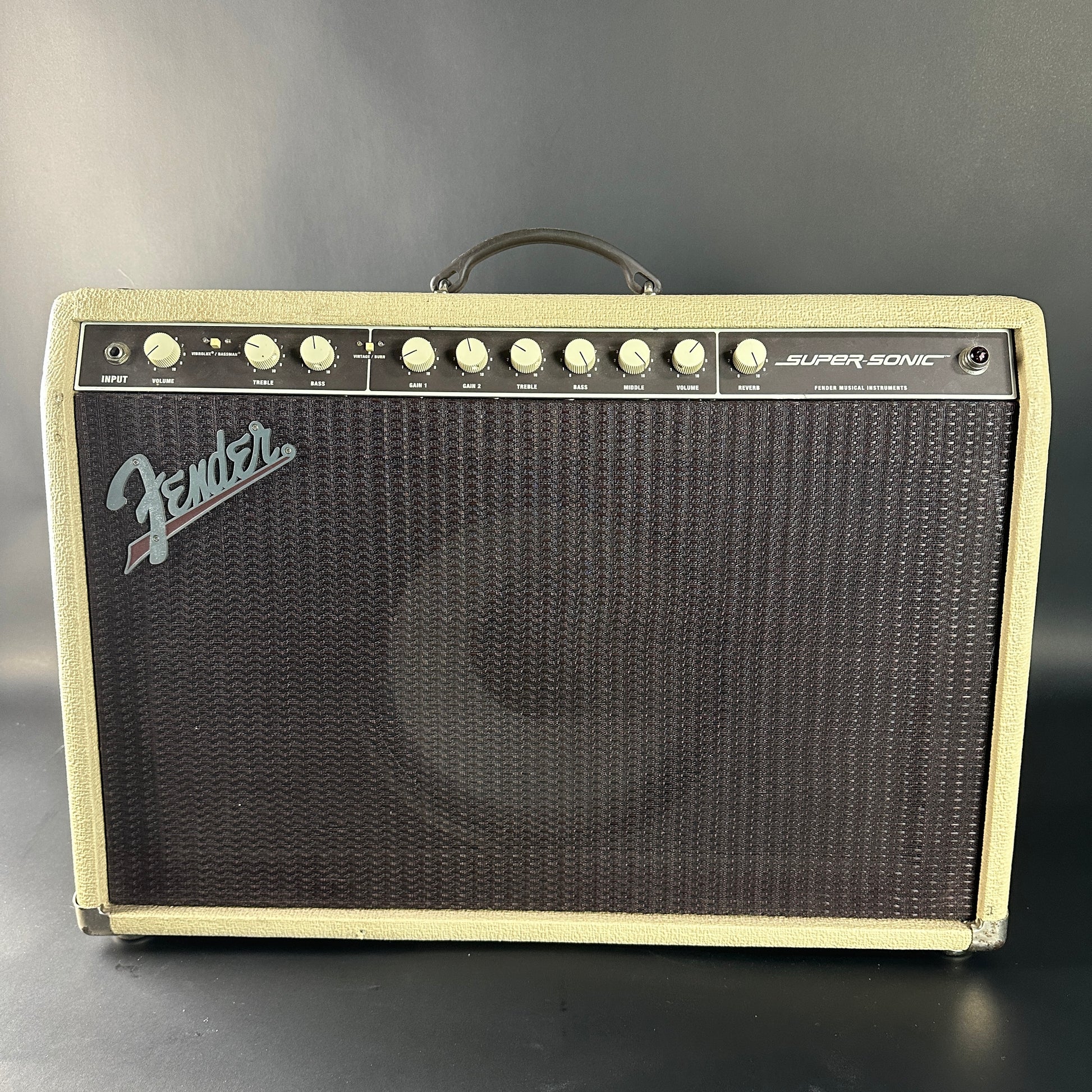 Fender Super Sonic guitar amplifier on a gray background