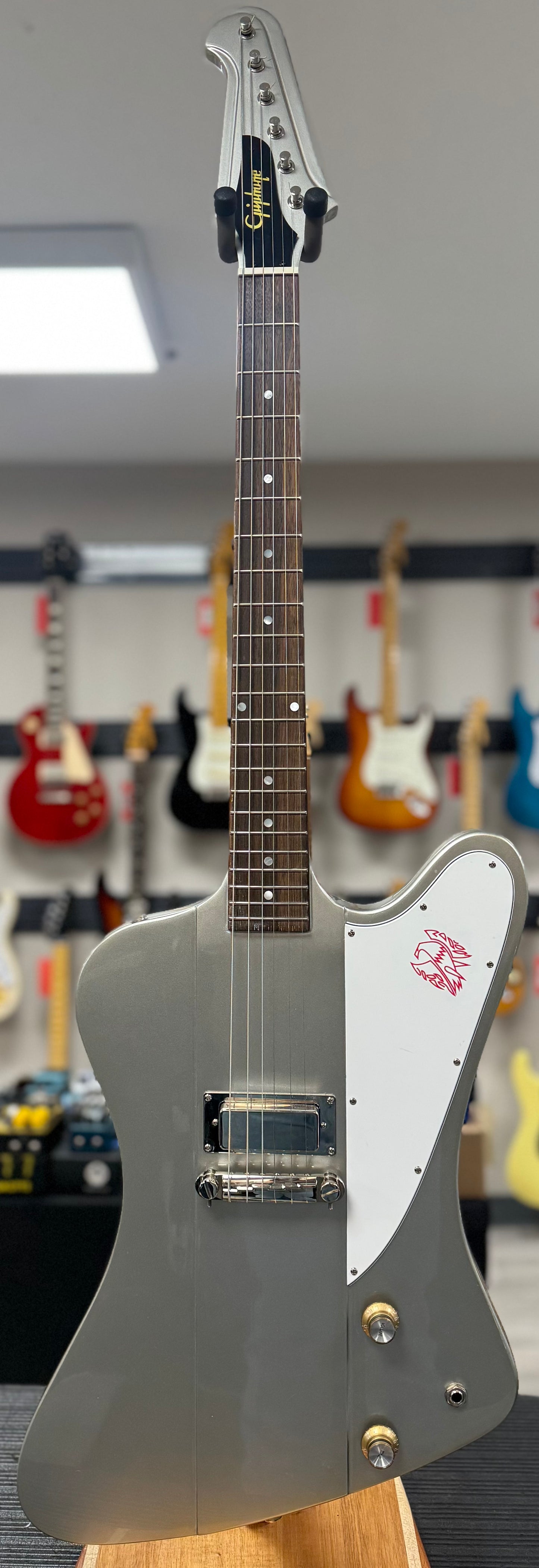 Front of whole Used Epiphone Inspired by Gibson Custom Firebird I Inca Silver w/case TSS6450