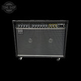 Roland guitar amplifier on a black background with 'Tone Shop' logo.