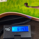 2024 PRS Paul Reed Smith CE24 Semi-Hollow Quilt Eriza Verde on scale displaying weight.