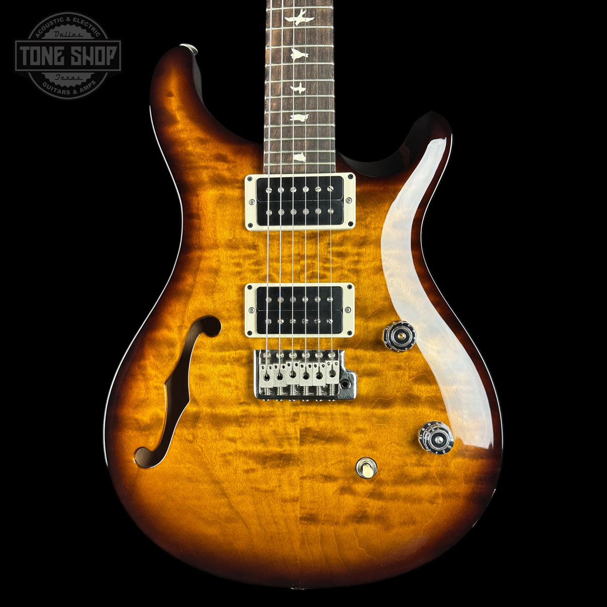 Front of 2024 PRS Paul Reed Smith CE24 Semi-Hollow Quilt Black Amber.