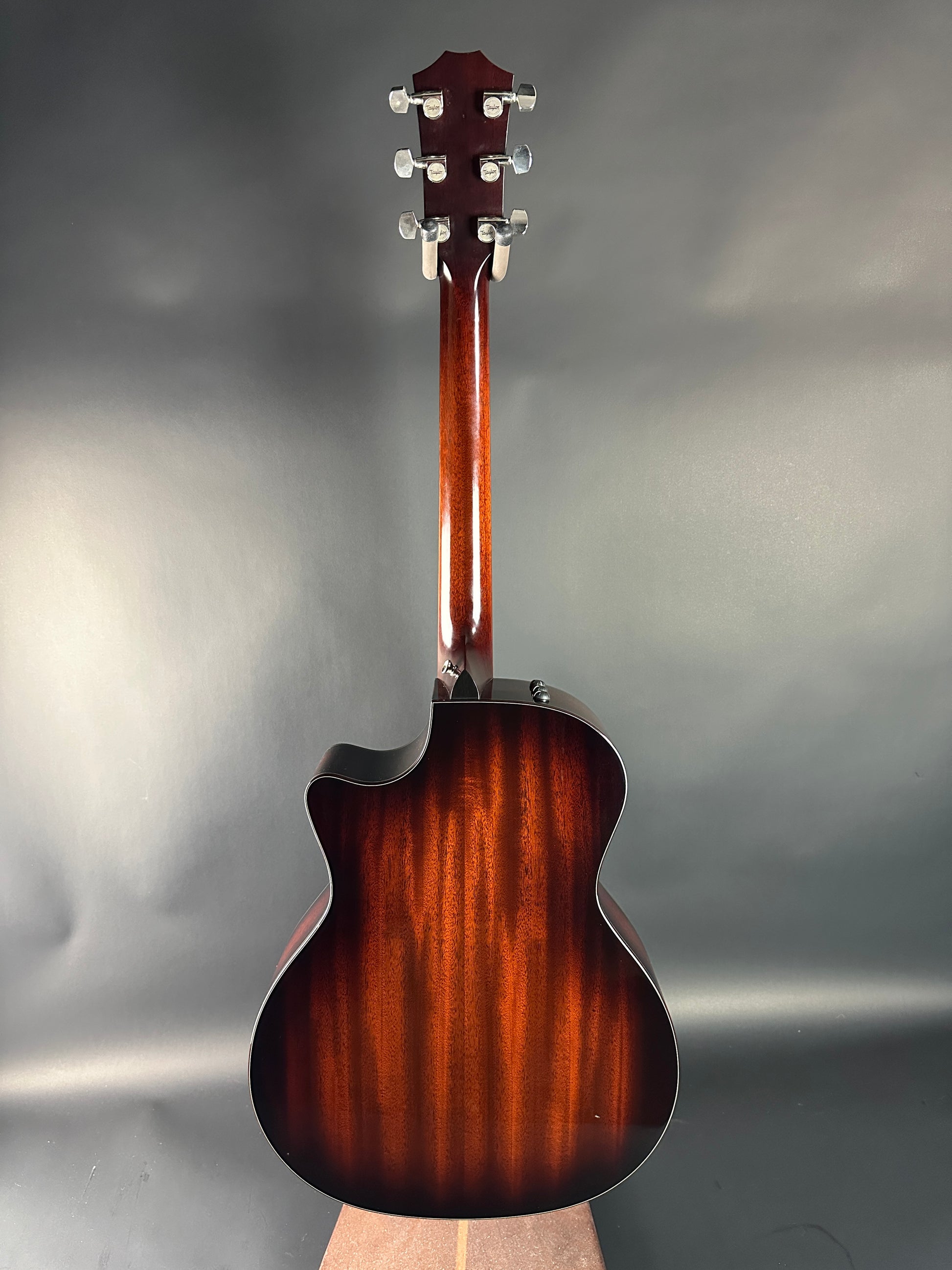 Acoustic guitar on a gray background