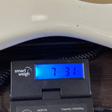 Fender Custom Shop Limited Edition Roasted '54 Strat Journeyman Relic '55 Desert Tan on scale displaying weight.