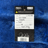 Product label on a blue textured background