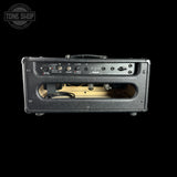 A black Fender guitar amplifier head photographed from the front against a solid black background, with a Tone Shop watermark in the upper left corner.