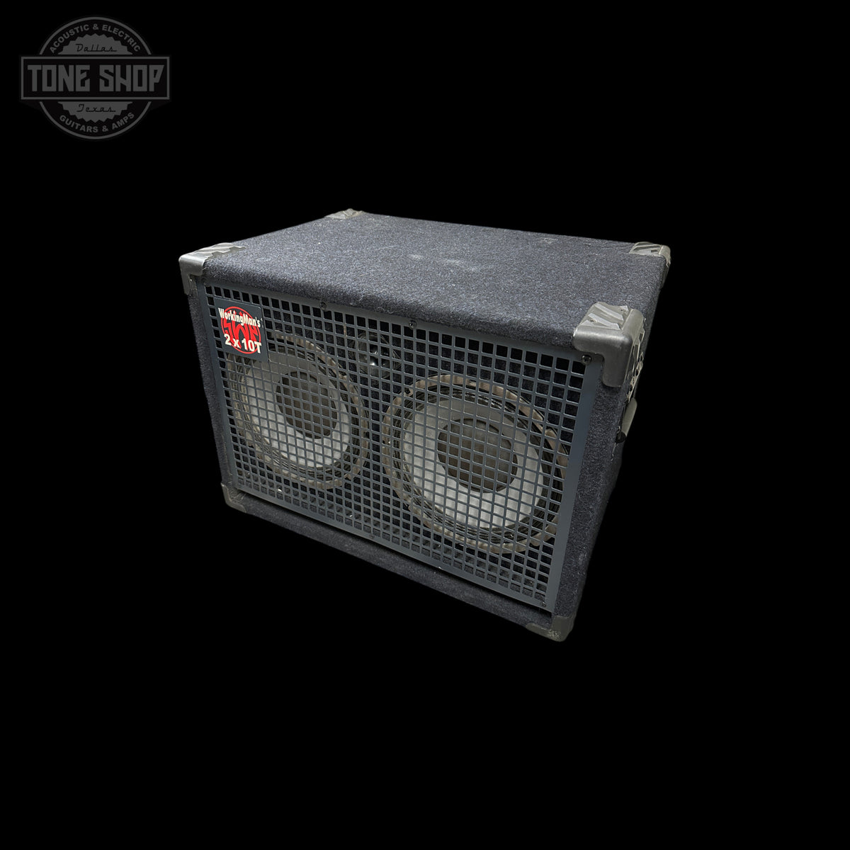 A vintage black speaker cabinet with two large front-facing speakers behind metal grilles, shown at an angle on a solid black background. A Tone Shop watermark is visible in the top-left corner.