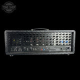Guitar amplifier head with control panel on a black background, featuring the Tone Shop logo.