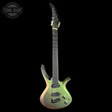 A modern double-cutaway electric guitar with a metallic iridescent finish shifting from olive green to pale gold, shown against a solid black background. A Tone Shop watermark is visible in the top-left corner.