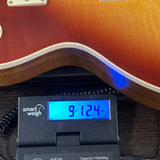 Gibson Les Paul Standard 60s Faded Vintage Bourbon Burst on scale.