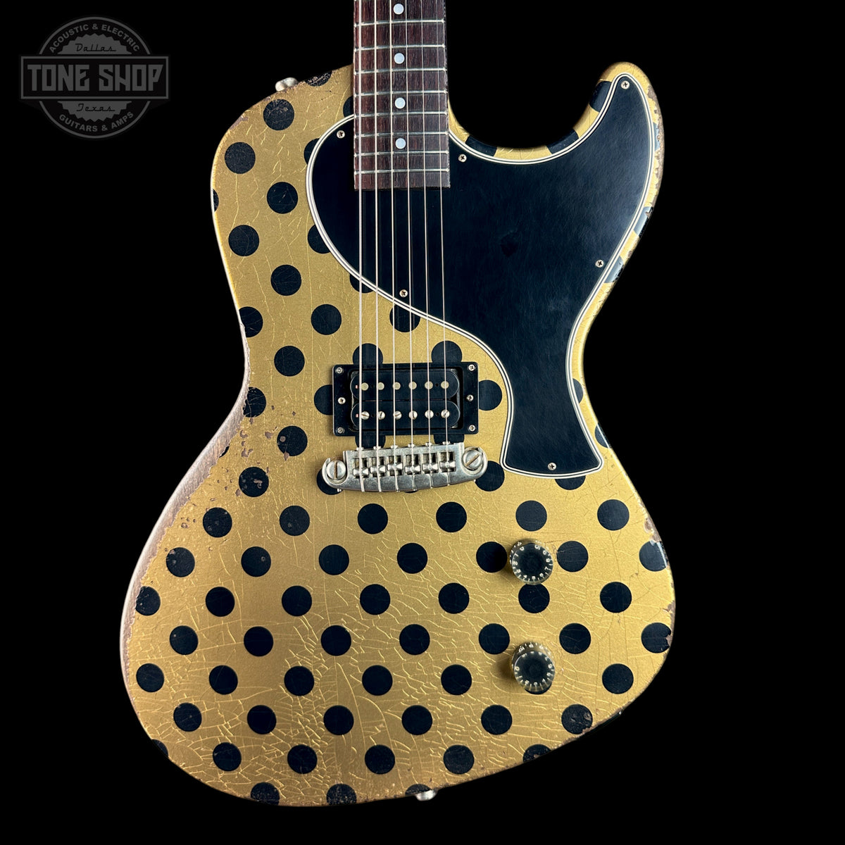Front of Rock N Roll Relics Revenge Jr Gold W/Black Polka Dots Relic.