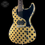 Front angle of Rock N Roll Relics Revenge Jr Gold W/Black Polka Dots Relic.