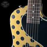 Front shoulder of Rock N Roll Relics Revenge Jr Gold W/Black Polka Dots Relic.