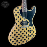 Front angle of Rock N Roll Relics Revenge Jr Gold W/Black Polka Dots Relic.