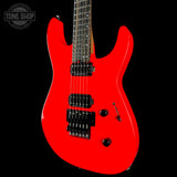 Red electric guitar on a black background with 'Tone Shop' logo.