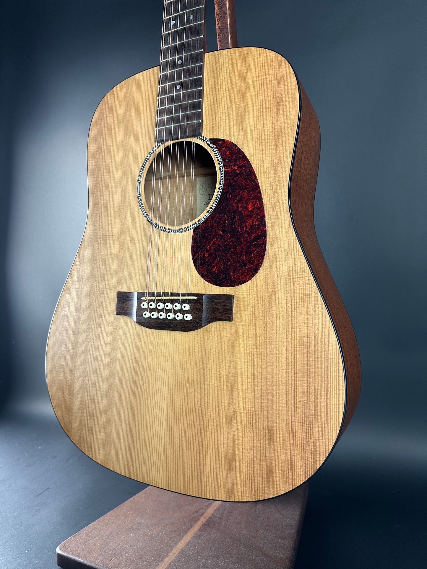 Acoustic guitar with a dark background