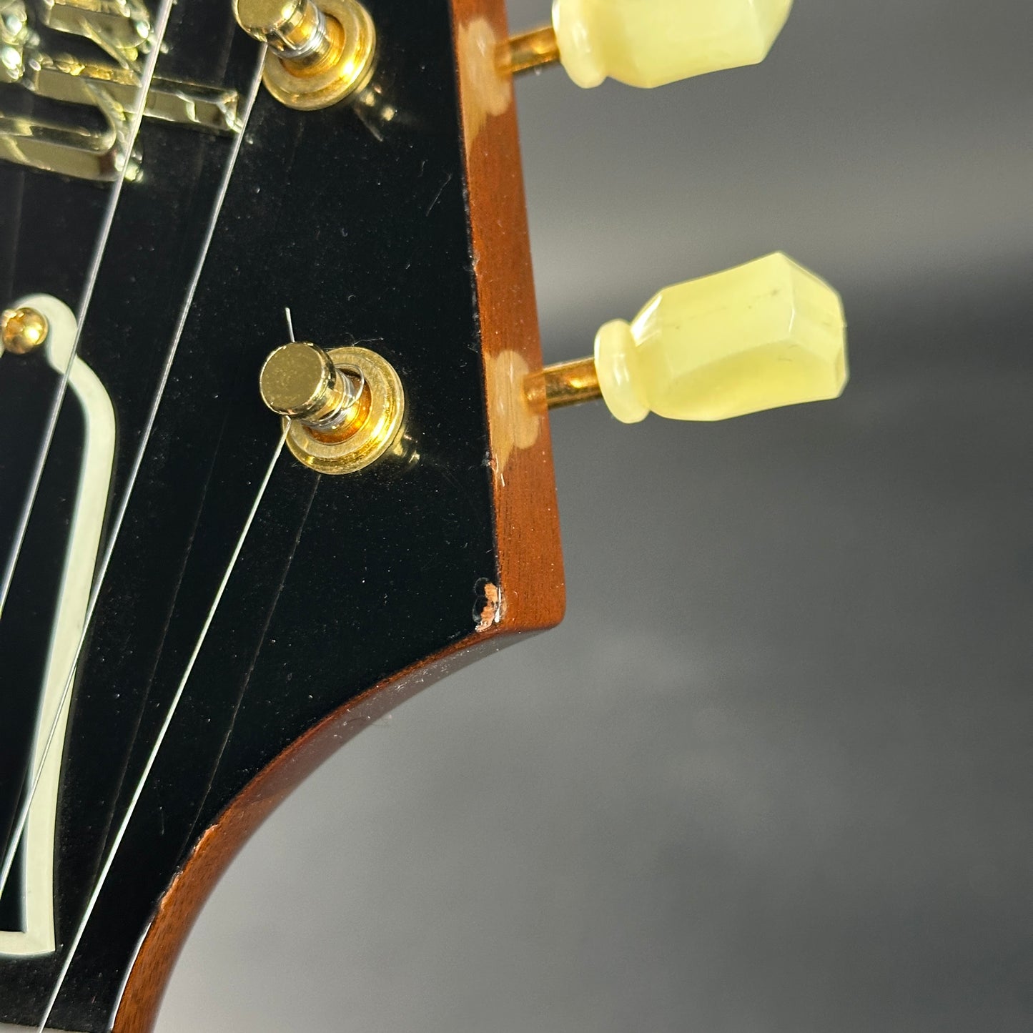 Wear on headstock of Used 2021 Gibson Custom Shop '58 Mahogany Flying V.