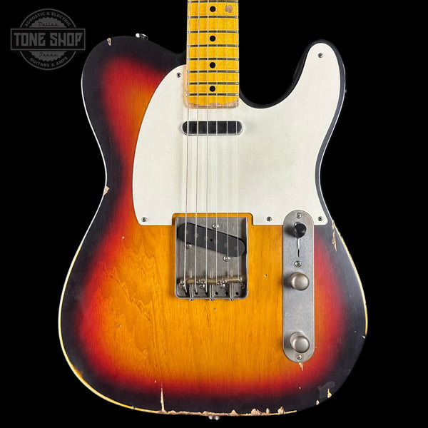Electric guitar with a sunburst finish on a black background, featuring the Tone Shop logo.