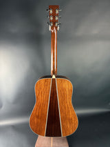 Acoustic guitar on a gray background
