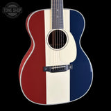 Front angle of Used Martin Custom Shop OM Red/White/Blue EIR/Sitka.