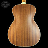 Wooden guitar back with 'Tone Shop' logo in the corner