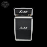 A Marshall dual-channel guitar amplifier cabinet with a silver metal frame and black front grilles, shown against a solid black background.