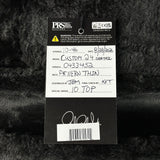 A black product tag for aPRS Custom Guitars, showing handwritten details for a 'Custom 24 Strat' in 'PF/Very Thin' neck, placed on a black furry surface.