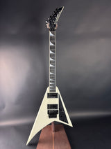 Electric guitar with a distinctive design on a dark background