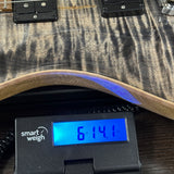 PRS Wood Library Custom 24 Stoptail Limited Edition Charcoal Stained Neck on scale displaying weight.