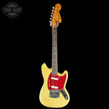 A yellow-finish electric guitar with a red glitter pickguard and a dark fretboard, shown against a solid black background. A 'TONE SHOP' watermark is visible in the top-left corner.
