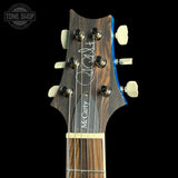 Headstock of PRS Select Wood Library McCarty Trem 10 Top Arctic Blue.
