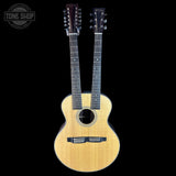 Double-neck guitar with acoustic and electric parts on a black background, featuring 'Tone Shop' logo.
