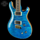 Front angle of PRS Select Wood Library McCarty Trem 10 Top Arctic Blue.