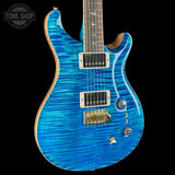 Front angle of PRS Select Wood Library McCarty Trem 10 Top Arctic Blue.
