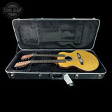 Guitar in a hard-shell case with 'Tone Shop' logo in the corner.