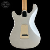 The back of a white electric guitar with a natural wood neck, shown against a solid black background. A 'Tone Shop' watermark is visible in the top-left corner.