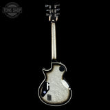 Metallic silver electric guitar on a black background with 'Tone Shop' logo.