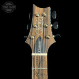 Headstock of PRS Wood Library Custom 24 Stoptail Limited Edition Faded Whale Blue Stained Neck.