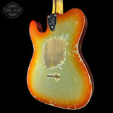 Vintage electric guitar with a sunburst finish on a black background, featuring the Tone Shop logo.