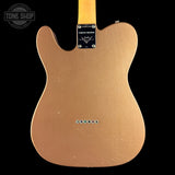 Back view of a brown electric guitar with 'Tone Shop' branding.