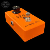Orange MXR phase 90 guitar effects pedal on a black background