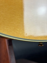 Close-up of a guitar's soundhole and body