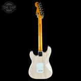 Fender Stratocaster electric guitar shown from the back, featuring a natural maple body and a yellow maple neck, photographed against a solid black background with a Tone Shop watermark in the top-left corner.