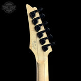 Close-up rear view of an electric guitar headstock with six black tuning pegs and a light natural wood backplate, shown against a black background. A Tone Shop watermark is visible in the upper left corner.