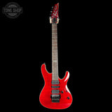 A red electric guitar with a flamed maple top and black hardware, shown vertically against a solid black background. A Tone Shop watermark is visible in the top-left corner.