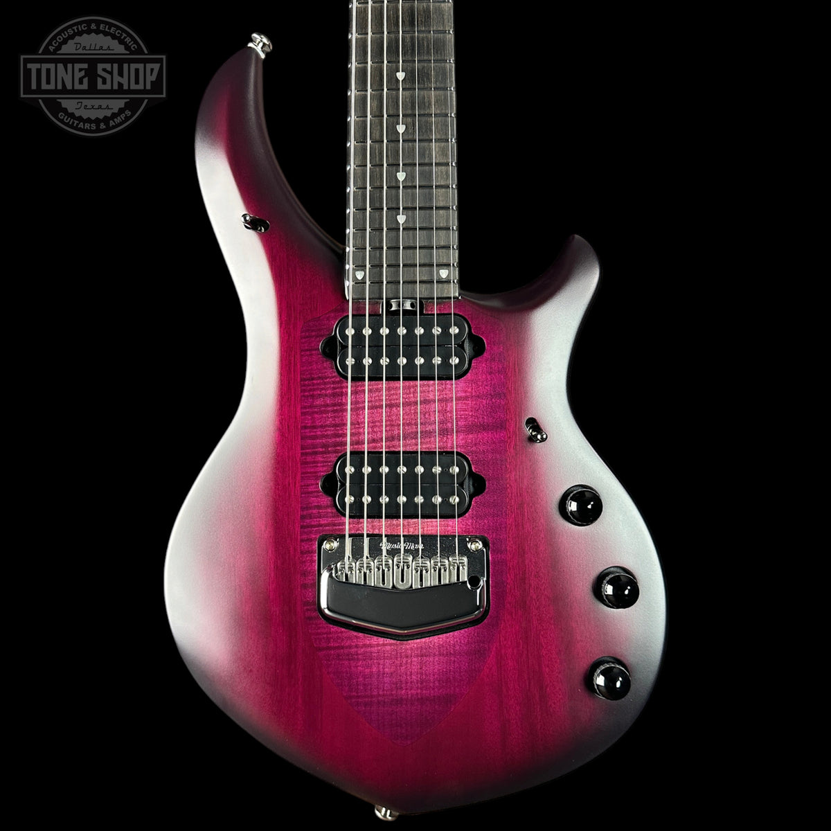 A high-end electric guitar with a vibrant magenta-to-purple flame finish, shown from a front three-quarter angle against a solid black background. The brand 'Tone Shop' is watermarked in the top-left corner.