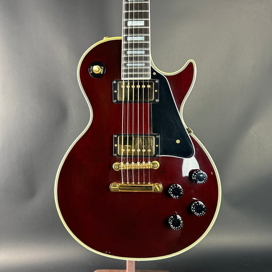 Electric guitar with a glossy finish on a gray background