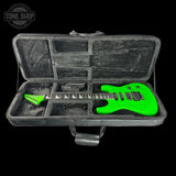 A bright neon green electric guitar displayed inside an open gray hard case with padded compartments, photographed against a solid black background. A Tone Shop logo watermark is visible in the top-left corner.