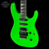 A bright neon green electric guitar shown from the side against a solid black background, featuring black hardware and pickups. A Tone Shop watermark is visible in the top-left corner.