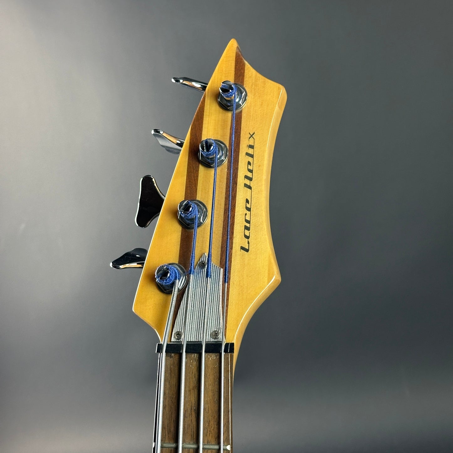 Headstock of Used Lace Helix Bass Red.